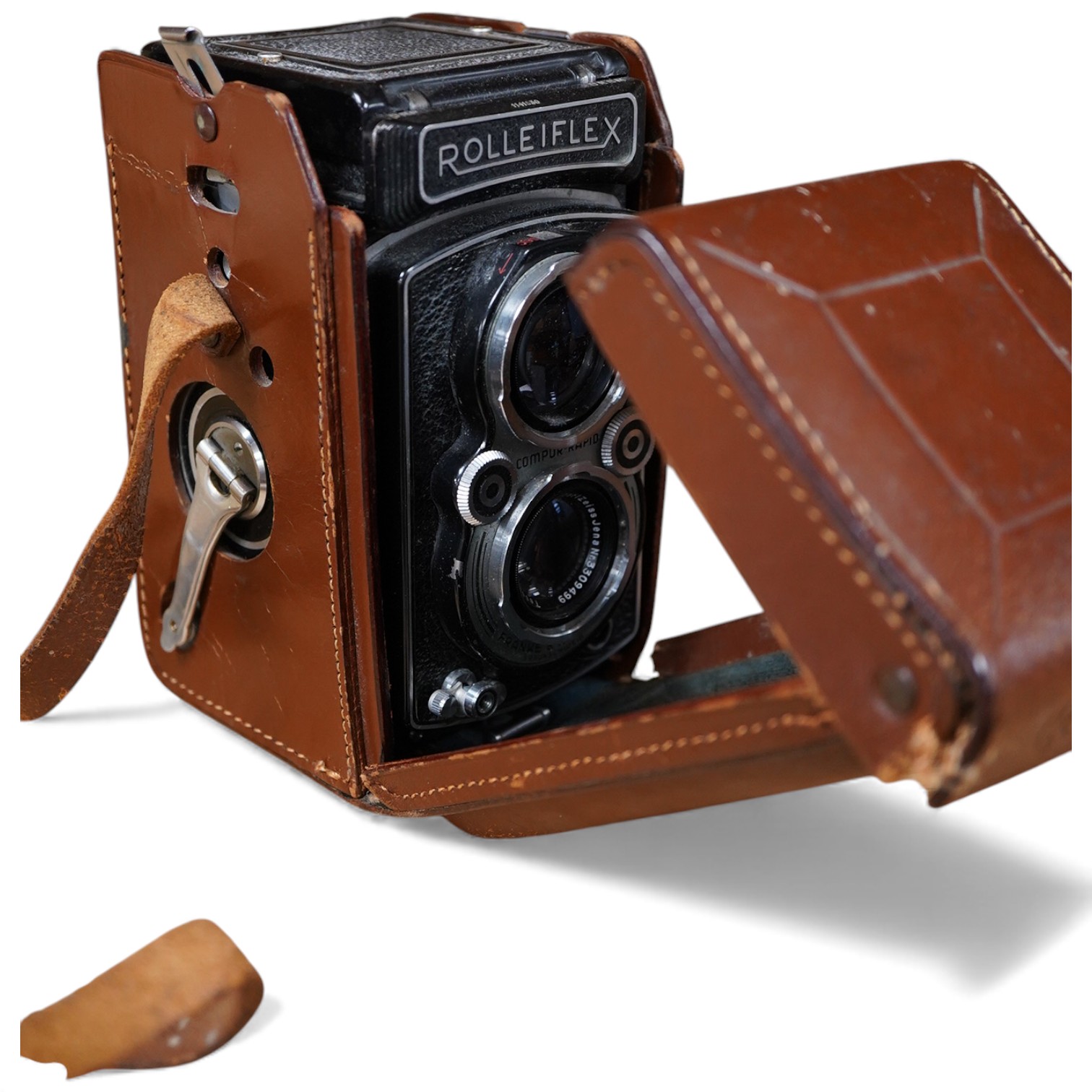 A mid 20th century German Franke & Heidecke Rolleiflex twin lens reflex camera in its original fitted leather case